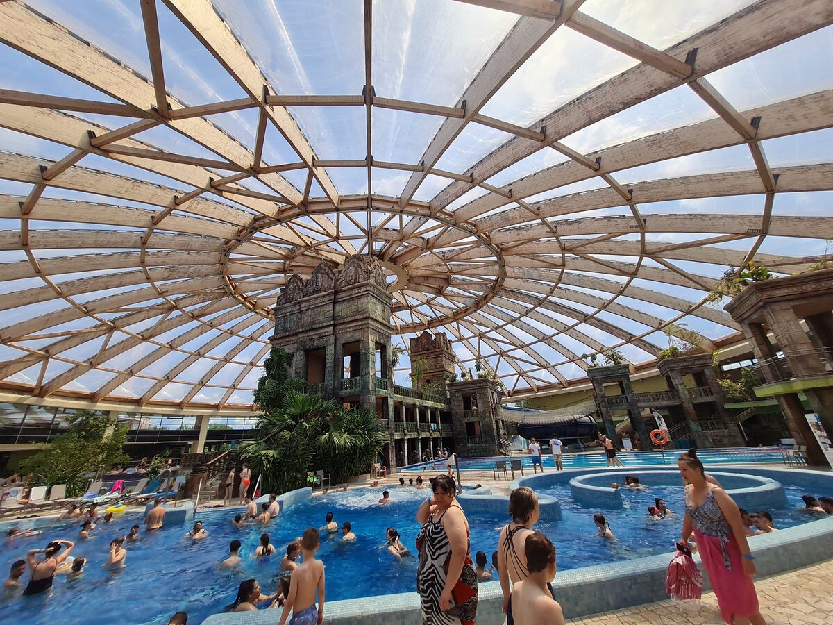 The indoor aquapark under its large glass dome at Aquaworld Resort, Budapest