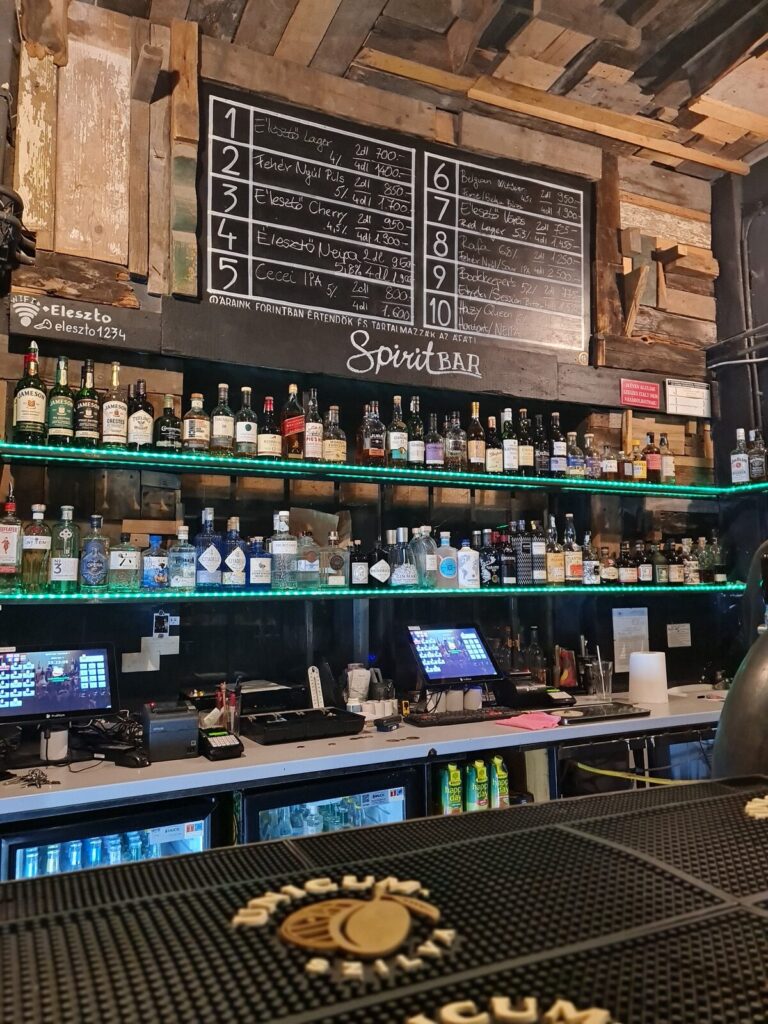 Bottle shelves at Élesztőház craft beer bar Budapest