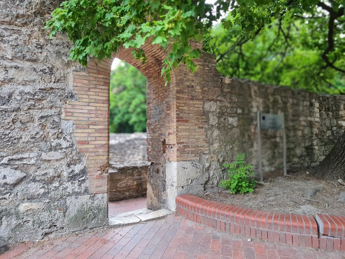 Crumbling stone archway at the Dominican Convent ruins, Margaret Island, Budapest