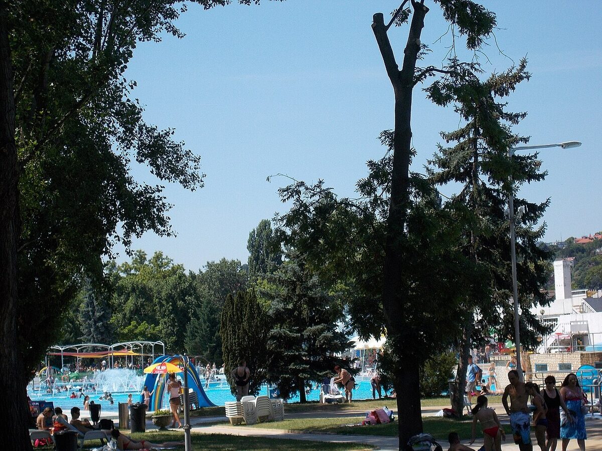 Outdoor pool area and sunbathing lawns at Palatinus Bath, Margaret Island, Budapest
