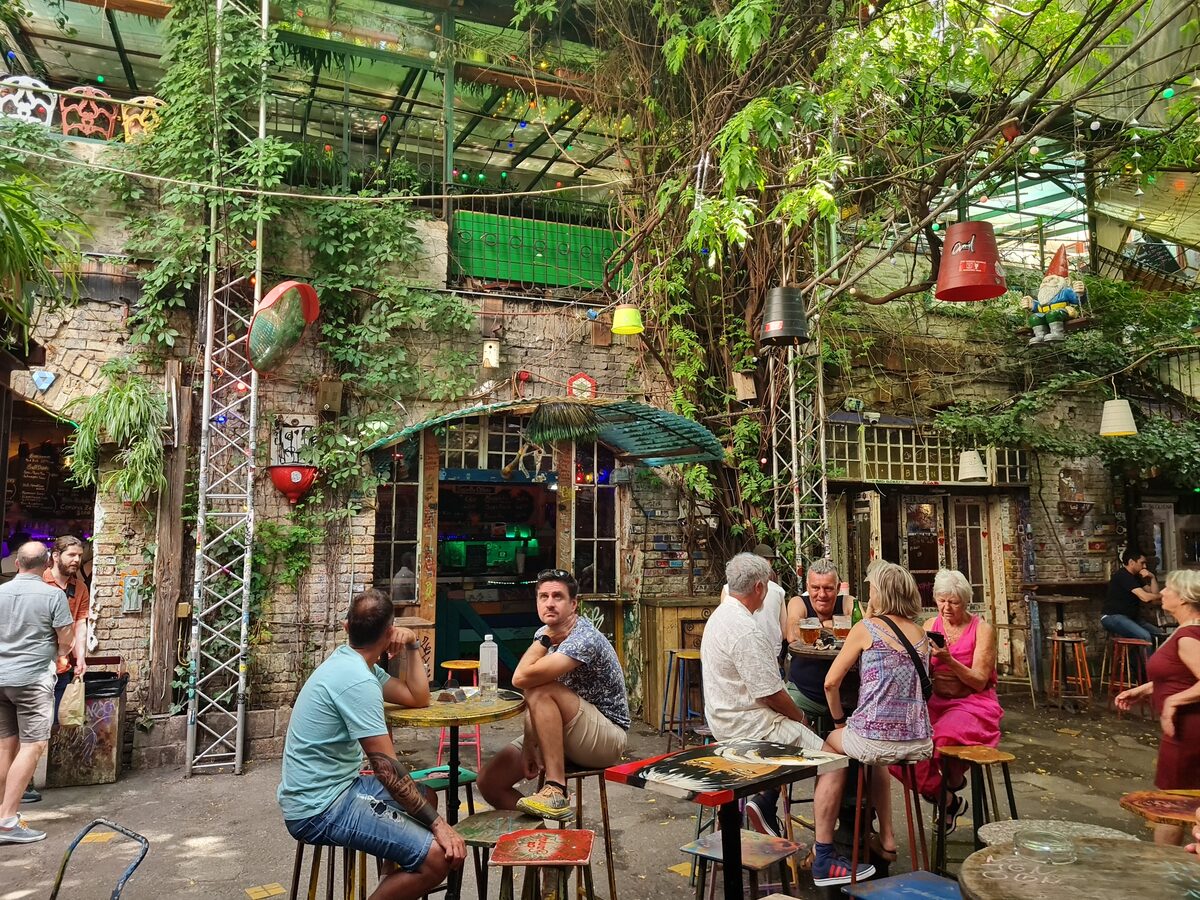 Szimpla Kert ruin bar courtyard in daylight Budapest Jewish Quarter