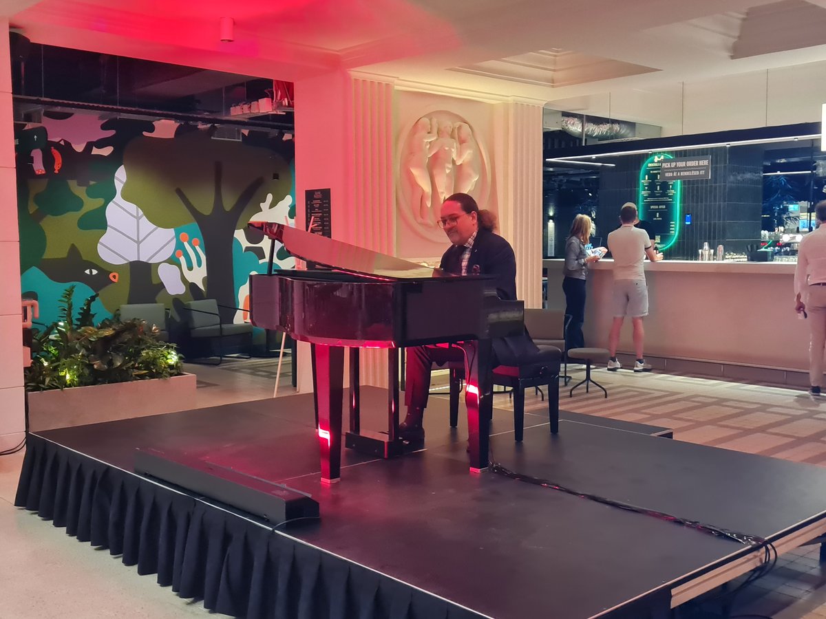 Live piano music performance at the Piano Bar Time Out Market Budapest Corvin Palace