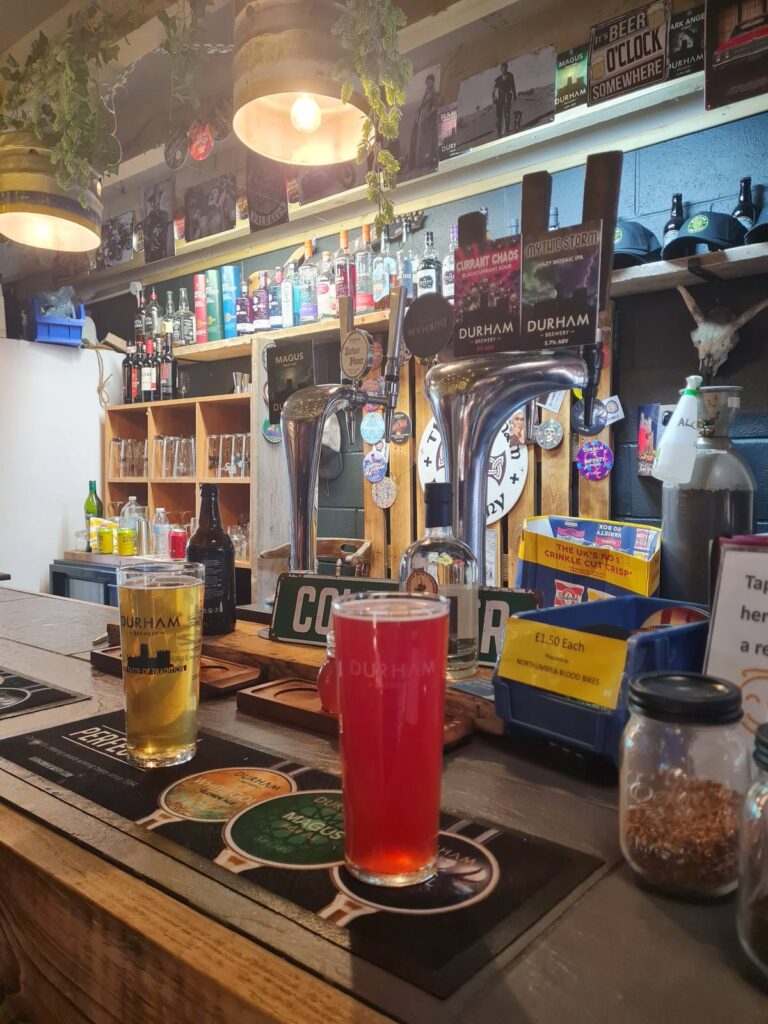 Durham Brewery tap room bar with Magus and Currant Chaos pump clips and two beers poured