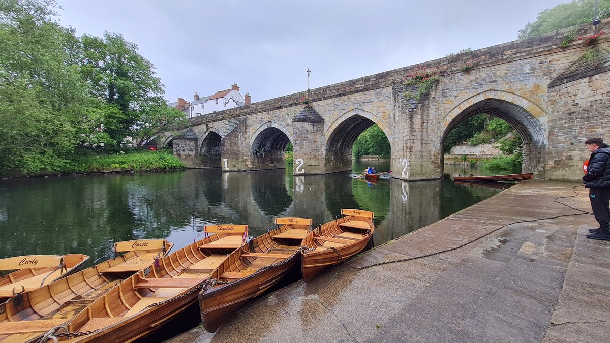 Hire boats moored below Elvet Bridge on the River Wear, Durham