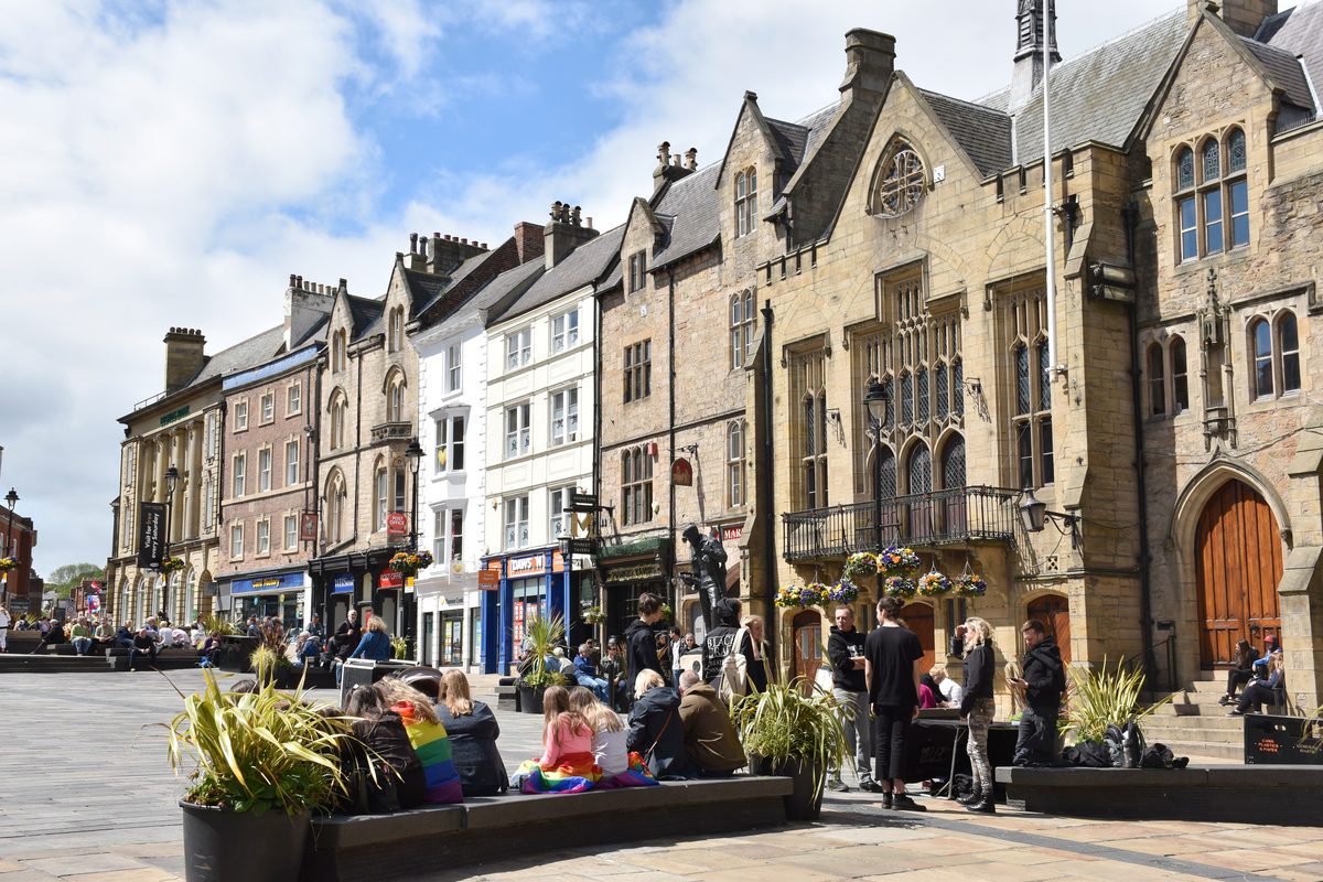 Victorian and Georgian buildings along the edge of Durham Market Place