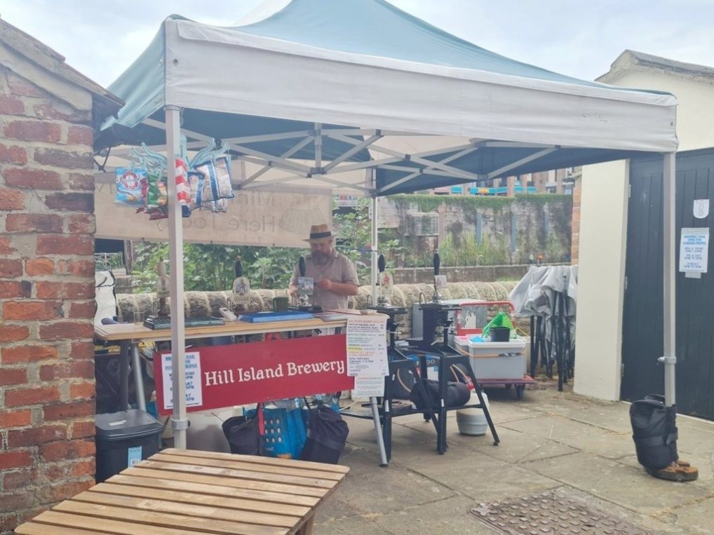 Hill Island Brewery stall under a gazebo in Fowler’s Yard, Durham