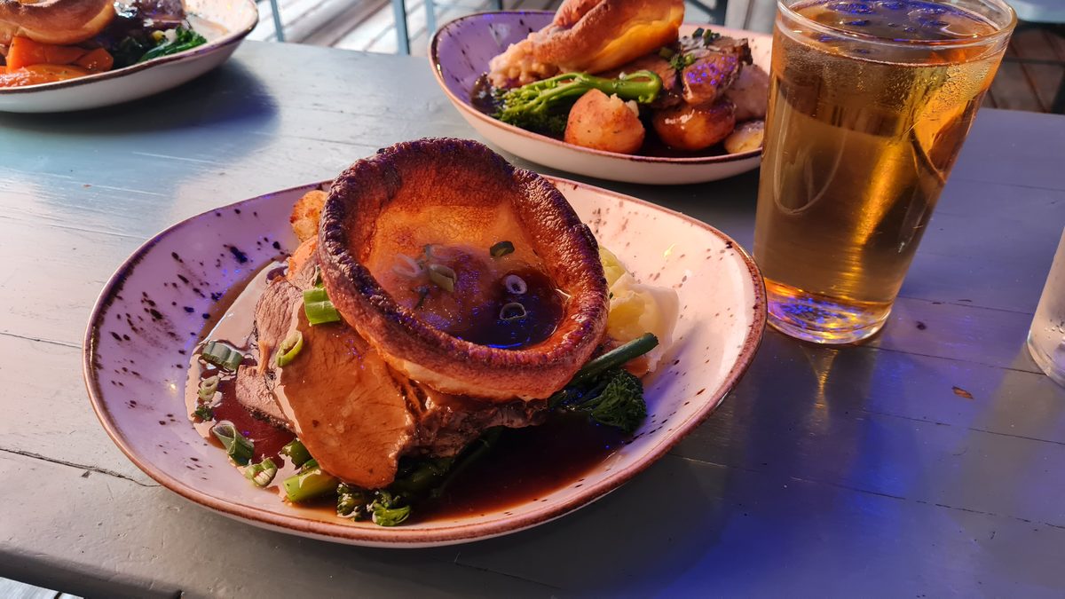 Sunday roast at The Corner House Windsor — Yorkshire pudding, beef and a tall cider