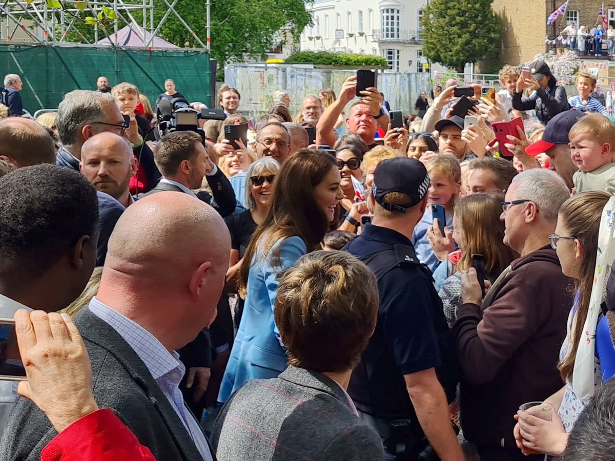 Catherine, Princess of Wales, talking to people at the barriers during the coronation walkabout in Windsor