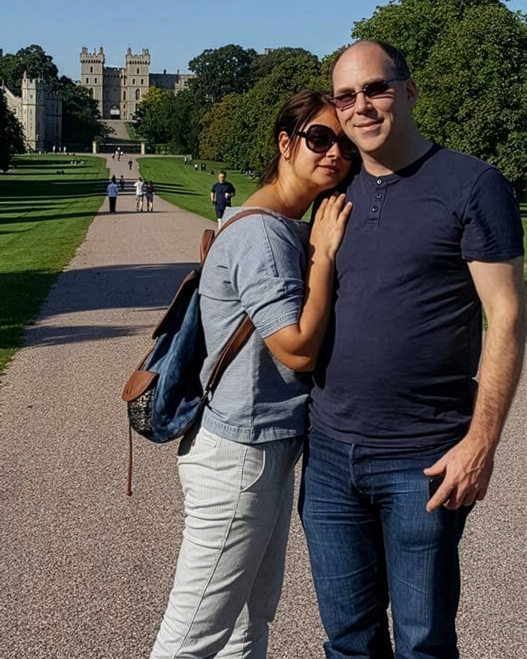 Olesia and Ian on the Long Walk in Windsor Great Park, with Windsor Castle behind them