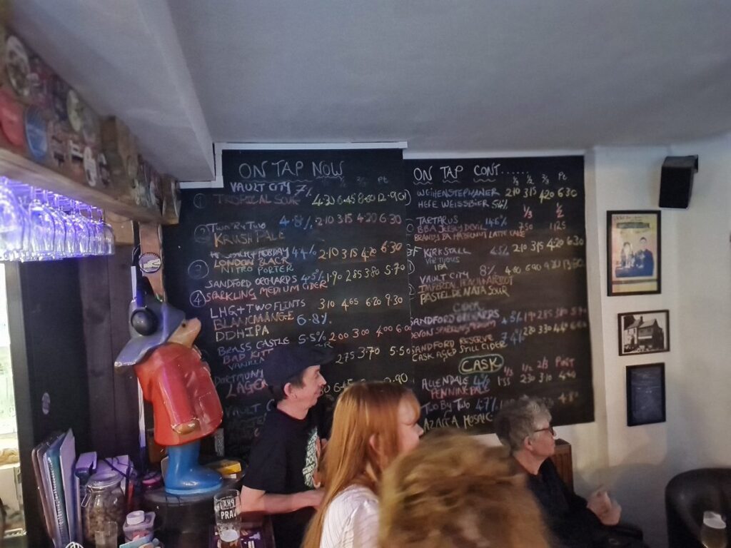 The two tap blackboards at The Holy GrAle, Durham, listing keg and cask beers