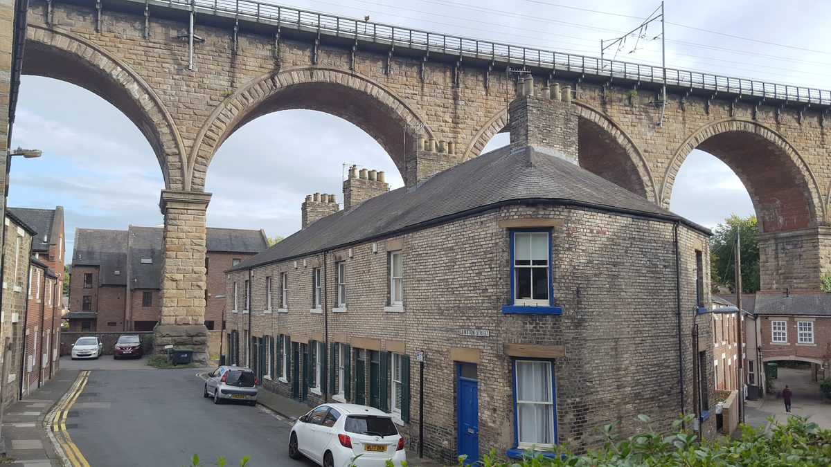 Durham railway viaduct striding over the houses