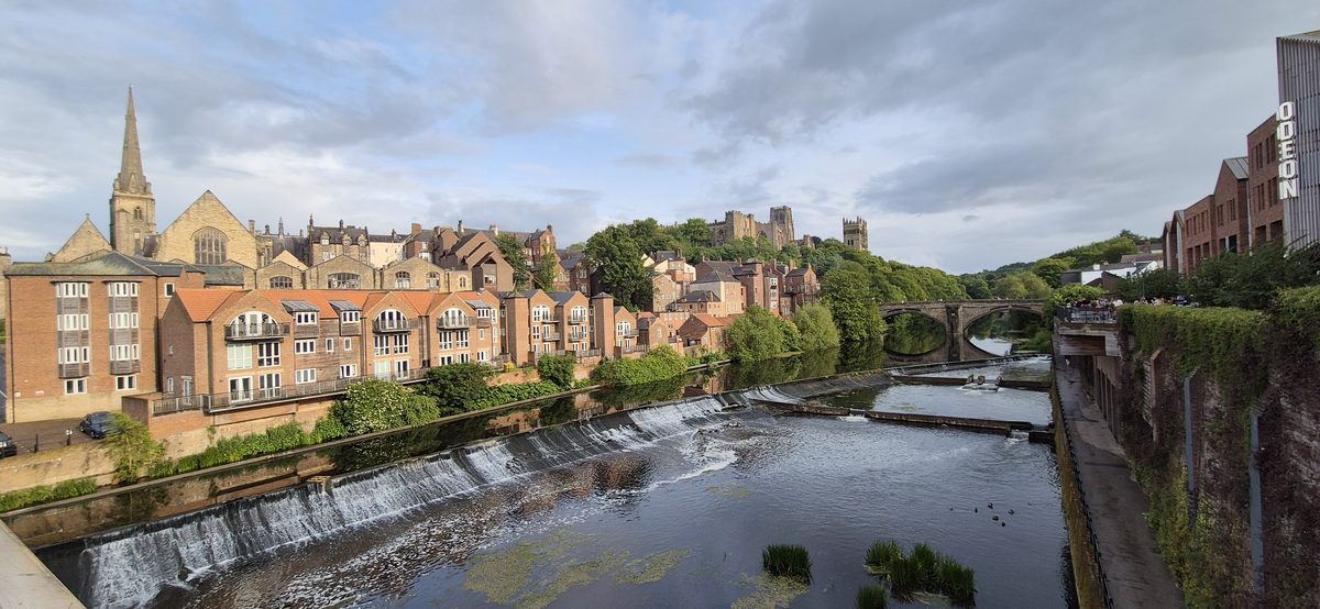 The weir on the River Wear with Durham town behind it