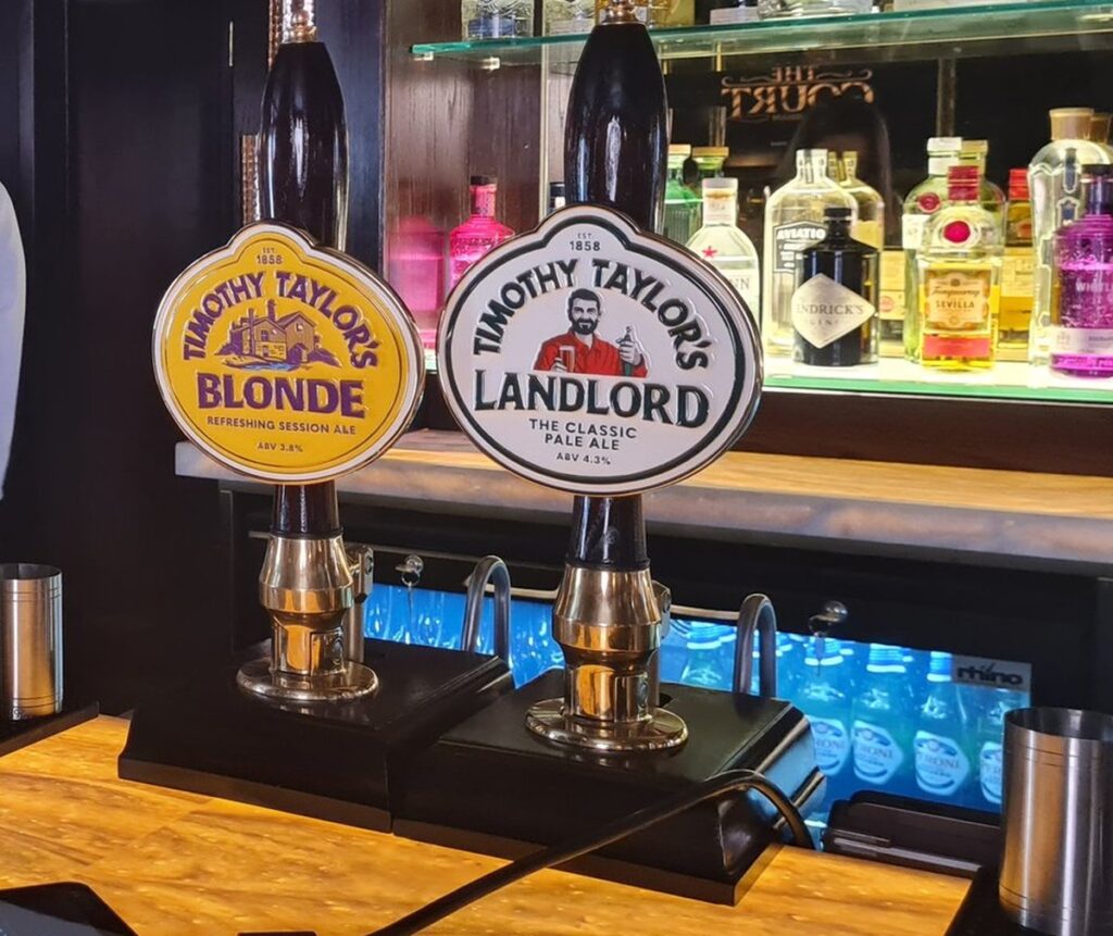 Timothy Taylor’s Blonde and Landlord cask handpulls on the bar at The Court, Durham