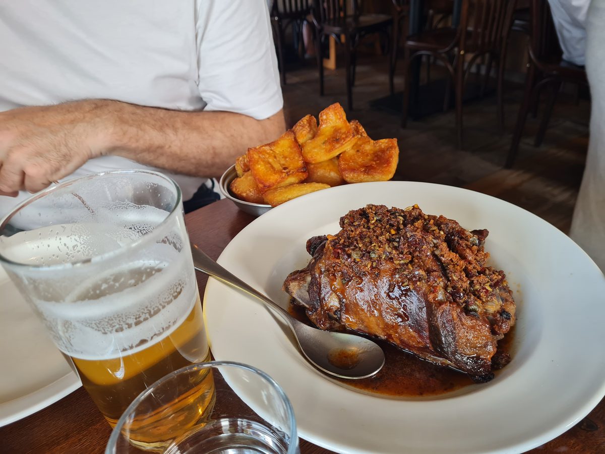 Roast lamb shoulder with roast potatoes and a pale ale at the Waterman's Arms, Barnes, London