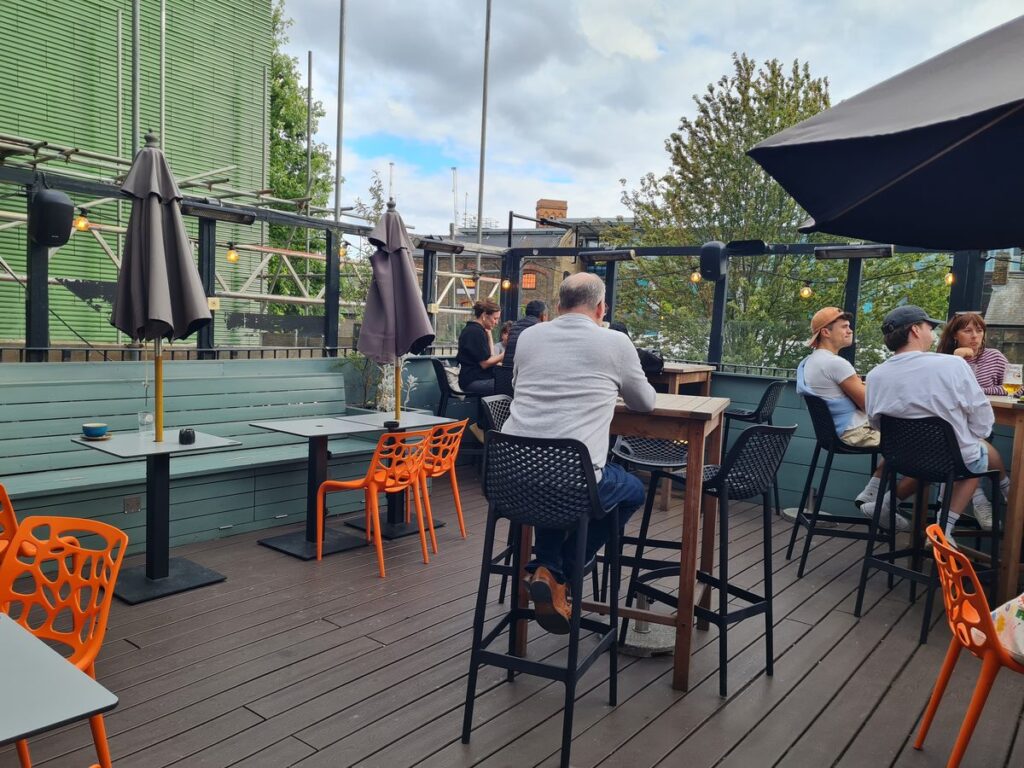 Roof terrace at the Lock Tavern, Camden, London, on a summer afternoon