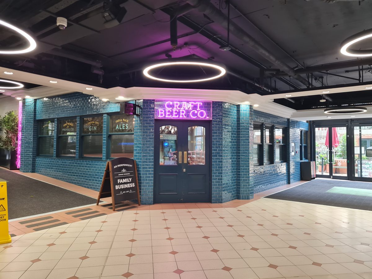 The Craft Beer Co. pub frontage inside the Hammersmith station foyer, London