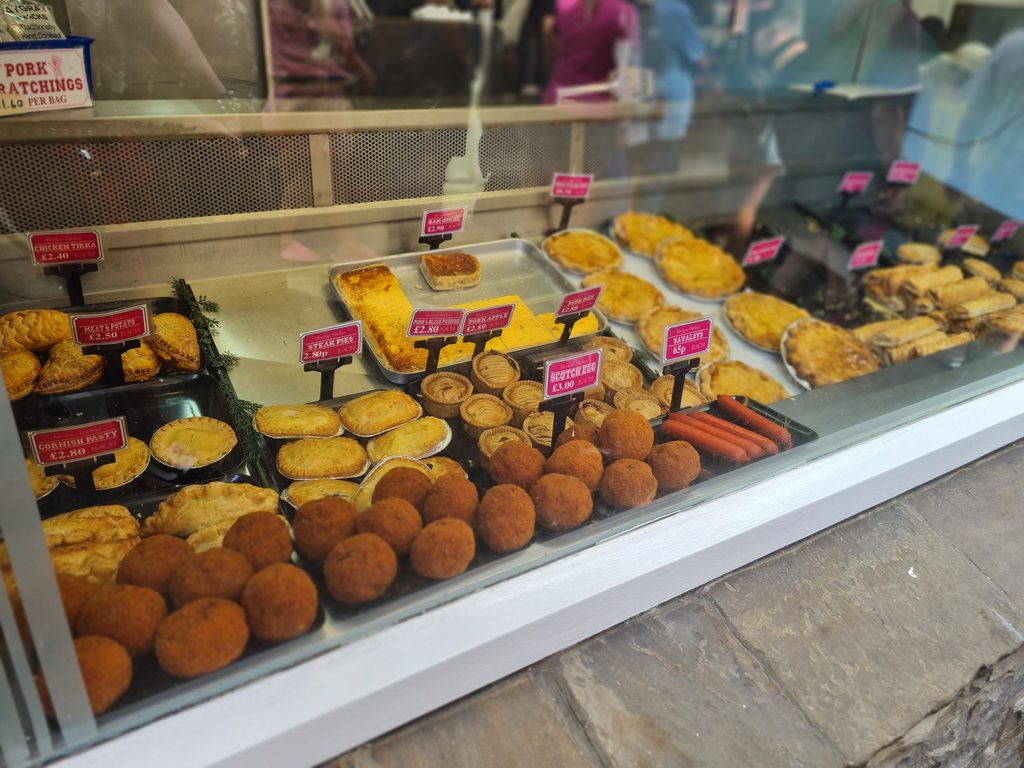 The counter at the Meat and Pie Shop on Golden Lion Bank in Whitby, filled with pies, pasties and scotch eggs