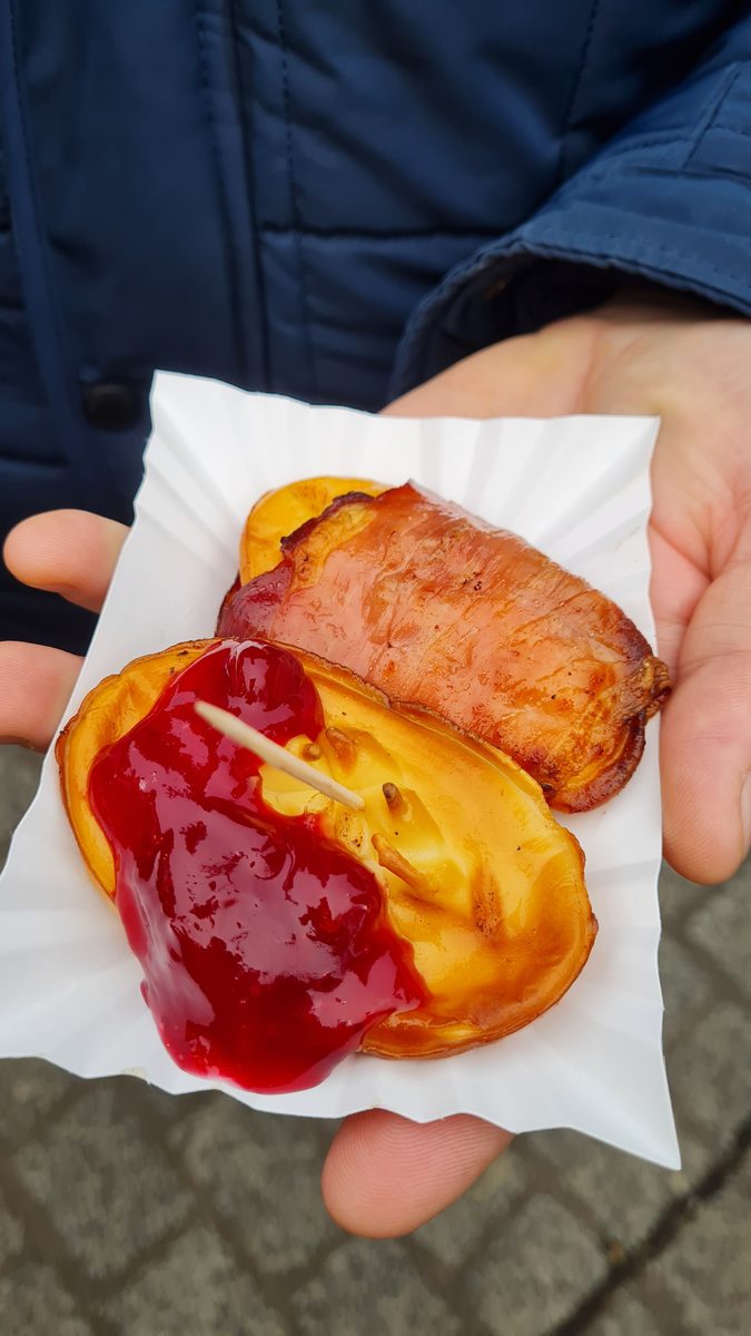 Grilled oscypek cheese with cranberry sauce, Kraków Christmas market