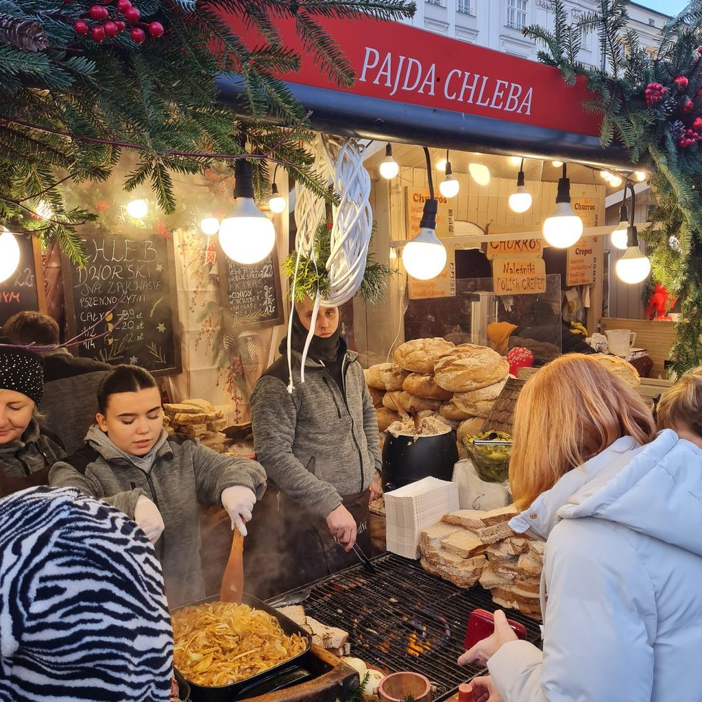 Pajda chleba stall selling bread with lard at the Kraków Christmas market